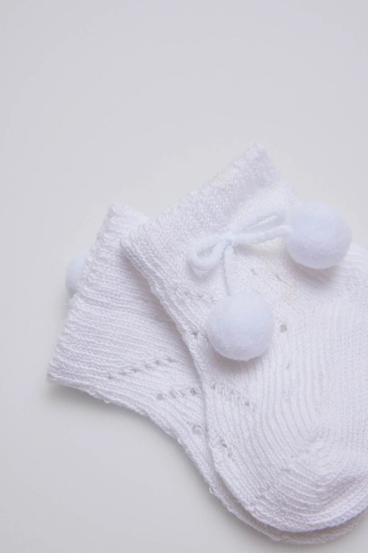 Calcetín Recién Nacido Blanco Borlitas